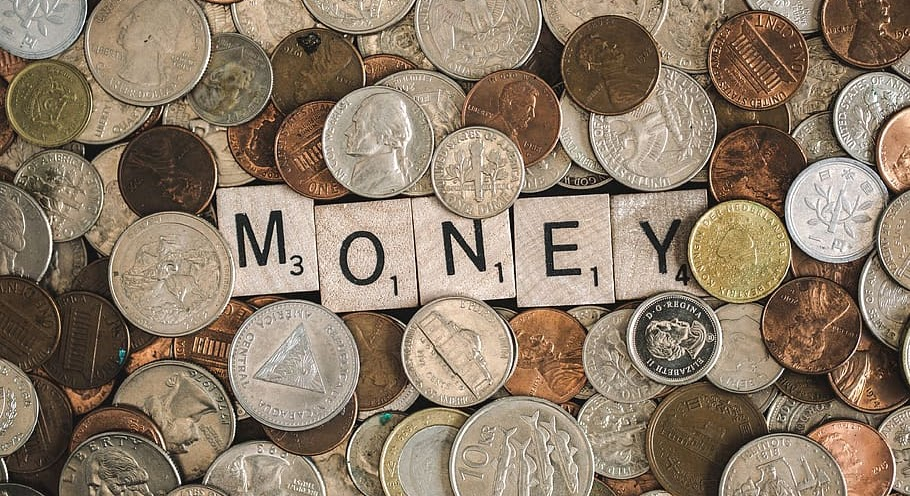 Image of the text 'money' and coins surrounding it